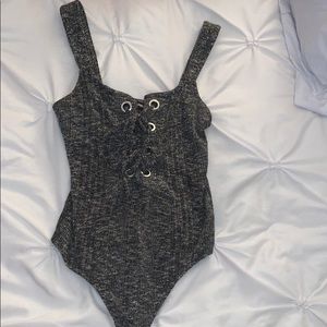 Grayish ribbed bodysuit